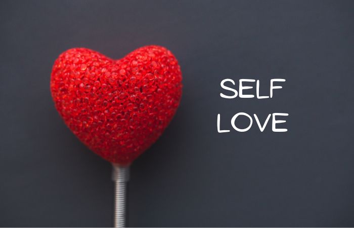Image of Self love text and red heart